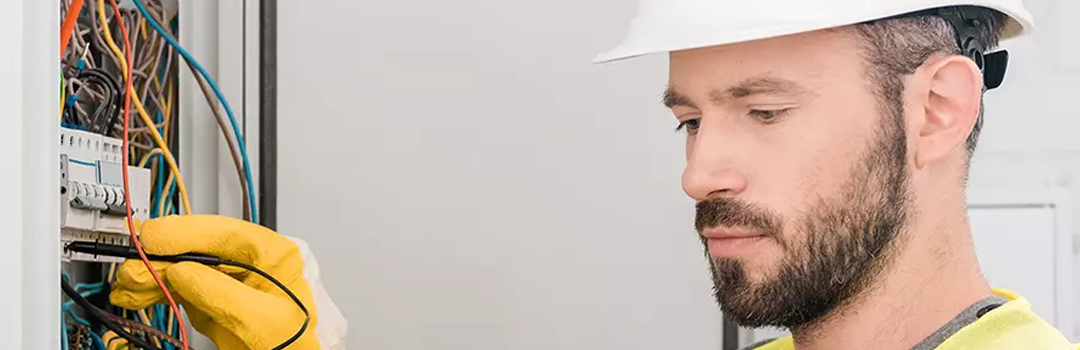 A man working with wires