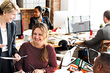a group of students laughing at the class